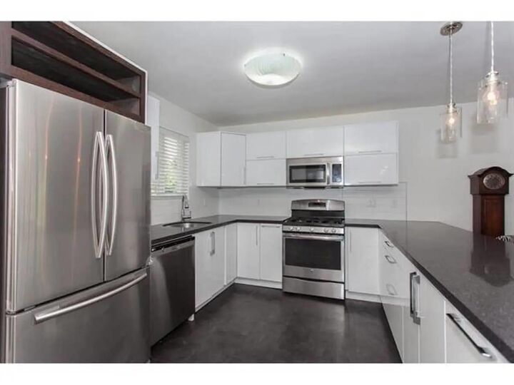 Property Photo:  7902 Burdock St  BC V2V 4Y1 