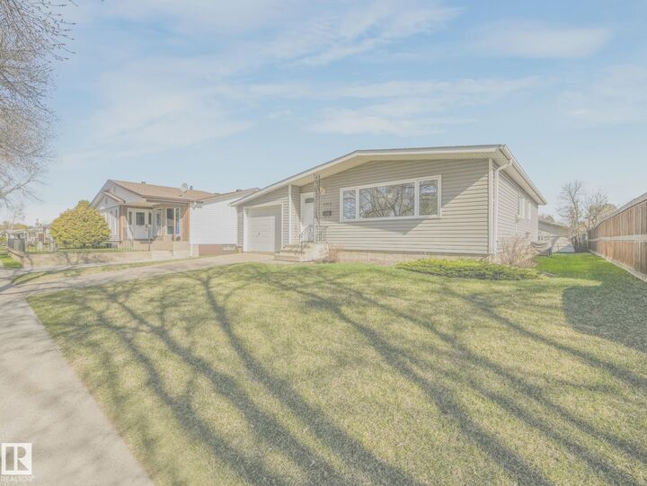 Property Photo: 5916 148 Avenue NW AB T5A 1T9