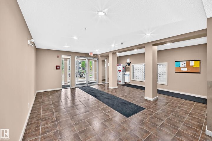 Property Photo:  12025 22 Avenue SW 404  AB T6W 2Y1 