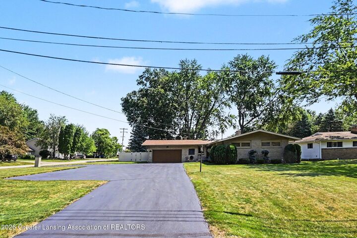 Property Photo:  4466 Arbor Drive  MI 48864 