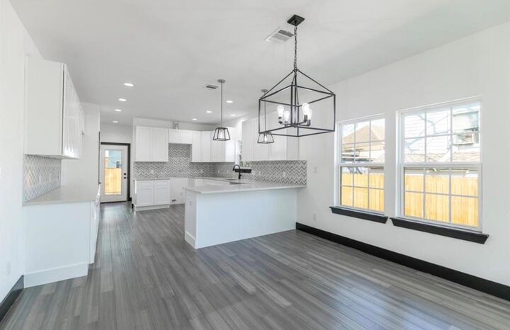 Property Photo:  409 Winnie Street  TX 77009 