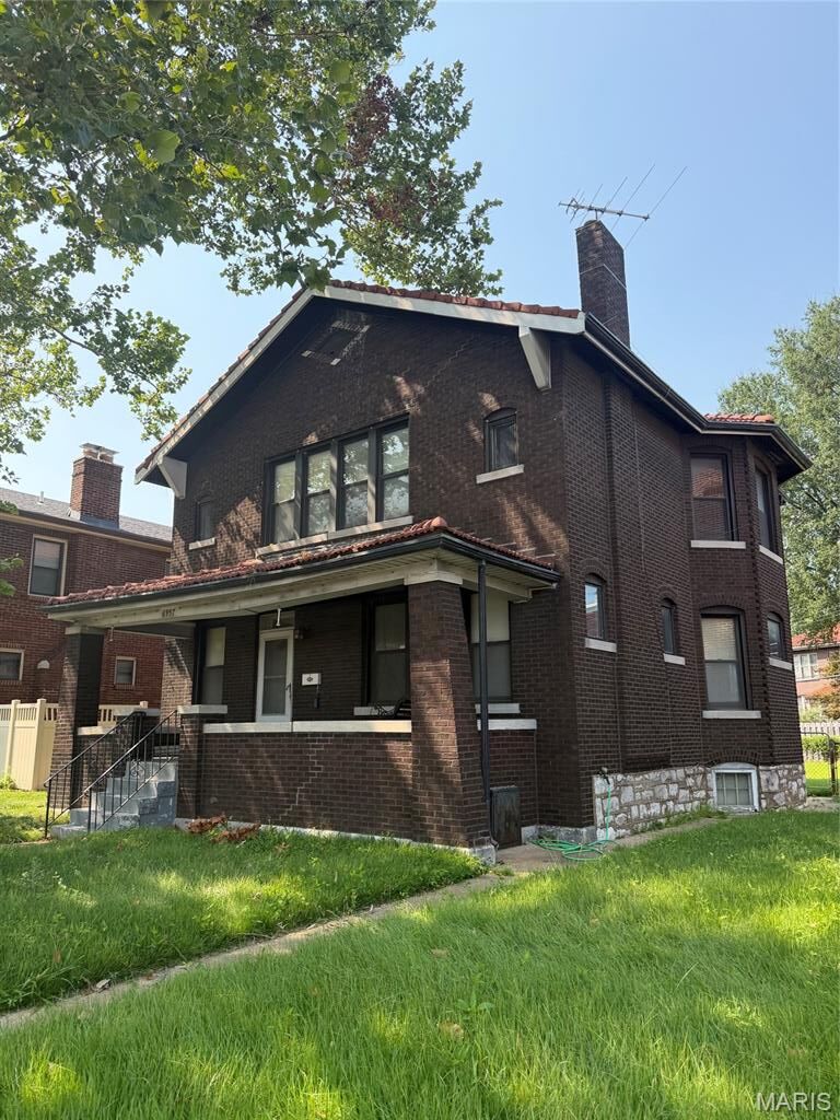 Property Photo: 6957 Clayton Avenue MO 63117