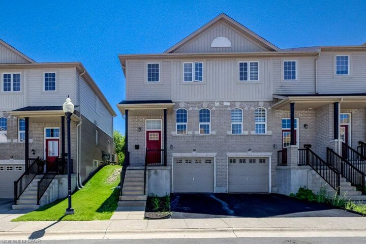 Property Photo: 105 Pinnacle Drive 30 ON N2P 1B8