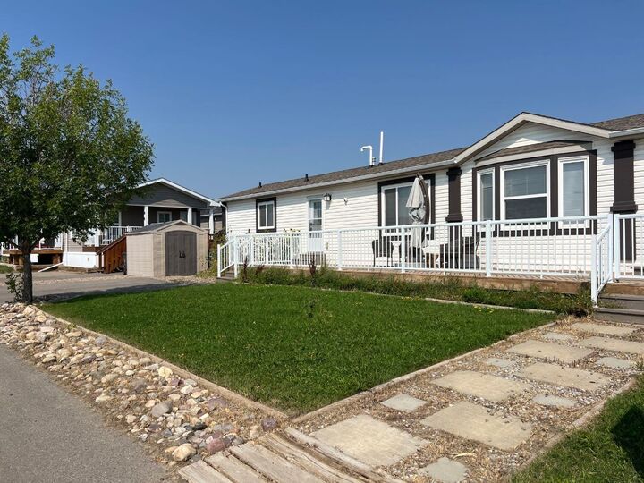 Property Photo: 4002 Seasons Boulevard AB T1M 0C6