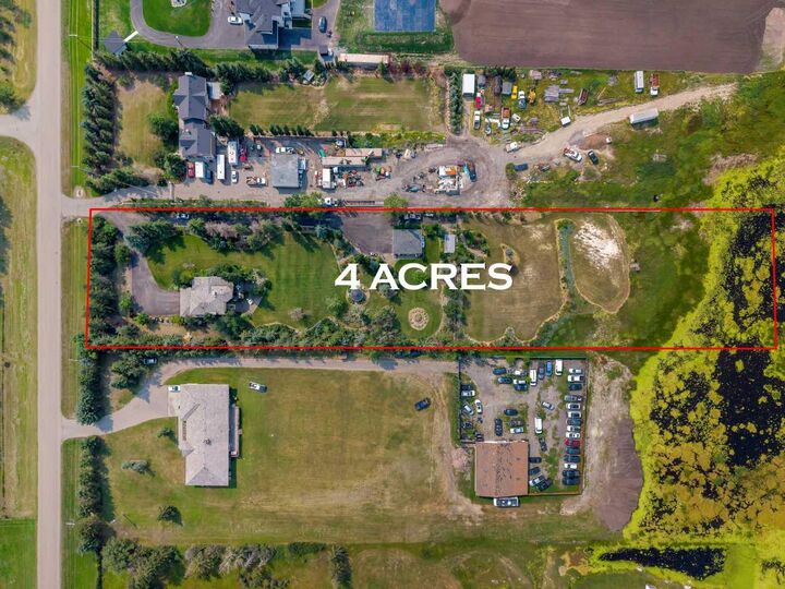 Property Photo: 280140 Township Road 241A AB T1X 0M5