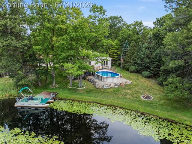 Property Photo:  8381 Rattalee Lake Road  MI 48348 