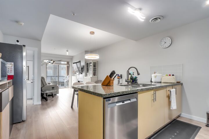 Property Photo: 6077 London Road 204 BC V7E 0A7