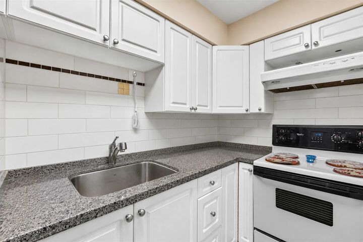 Property Photo: 10560 154 Street 101 BC V3R 8A3