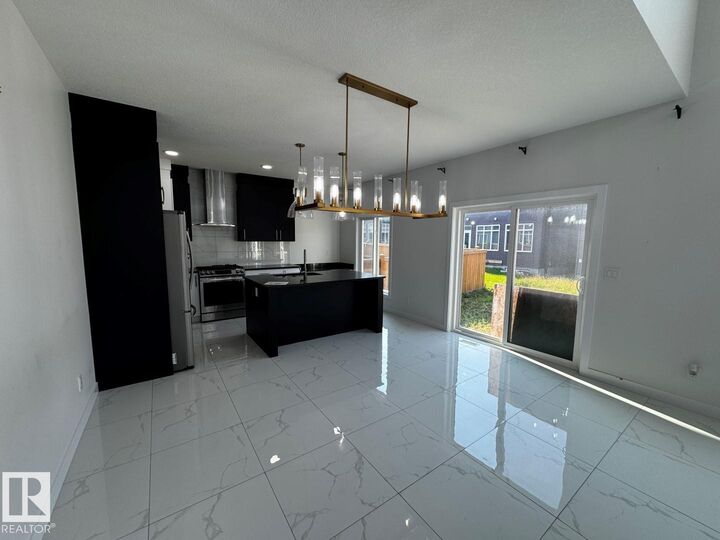 Property Photo:  5741 Kootook Way SW  AB T6W 4V9 