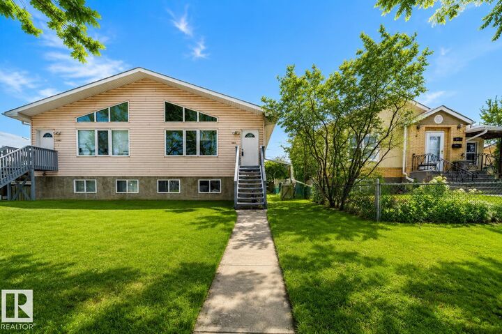 Property Photo:  12041/43 67 St NW NW  AB T5B 1M4 