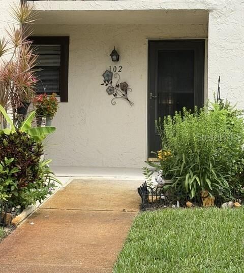 Property Photo:  2400 Winding Creek Boulevard 24-102  FL 33761 