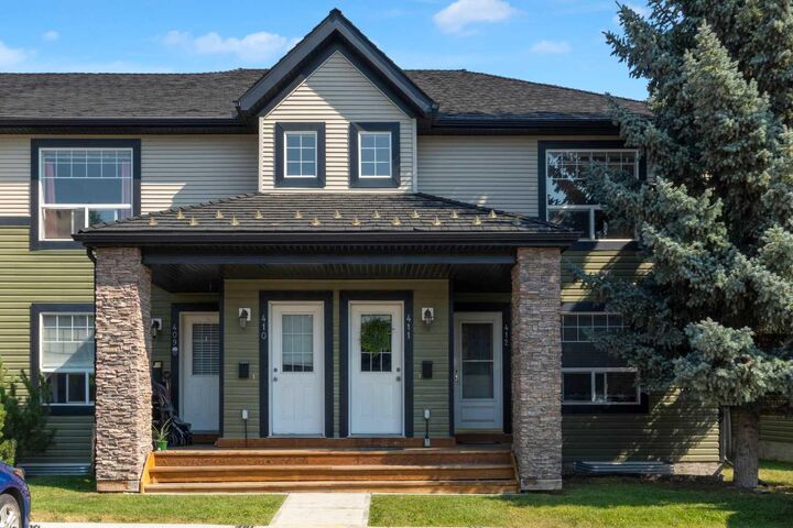 Property Photo: 140 Sagewood Boulevard SW 411 AB T4B 3H5