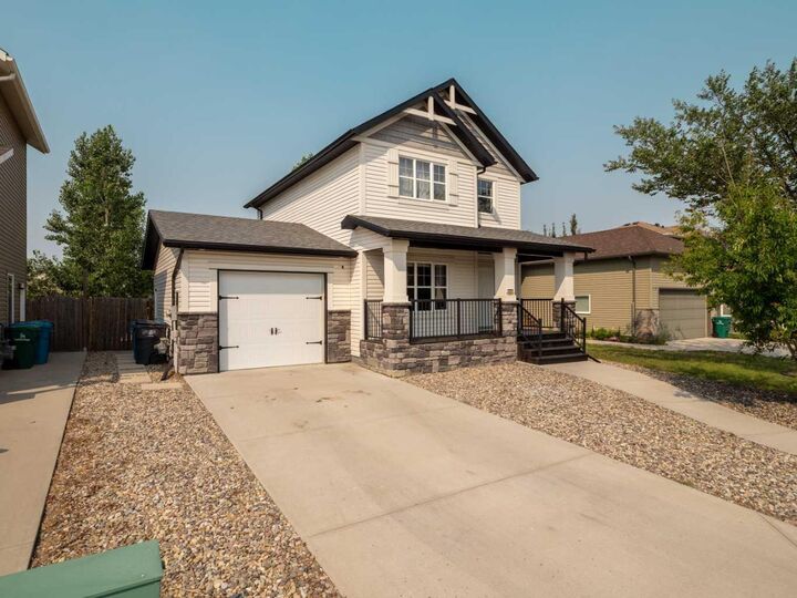 Property Photo:  120 Mt Sundial Court W  AB T1J 5B7 