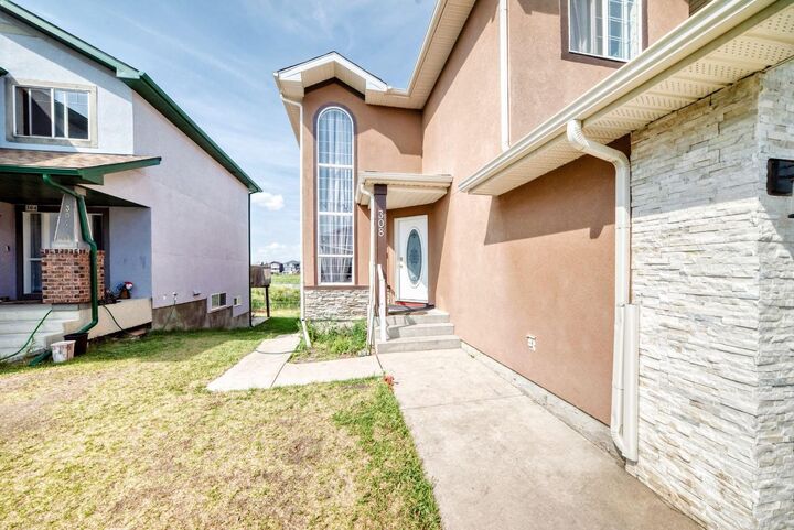 Property Photo: 308 Taracove Estate Drive NE AB T3J 5A1