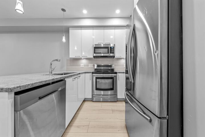 Property Photo: 20175 53 Avenue 208 BC V3A 0J8