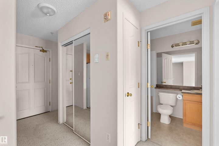 Property Photo:  16303 95 Street NW 224  AB T5Z 3V1 