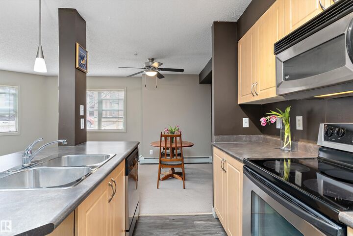 Property Photo: 11445 Ellerslie Rd SW 111 AB T6W 1T1