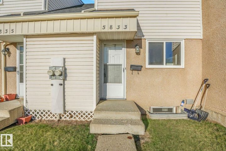 Property Photo:  5833 Riverbend Road NW  AB T6H 5A8 