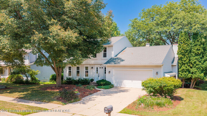 Property Photo:  1810 Shadywood Lane  MI 48864 