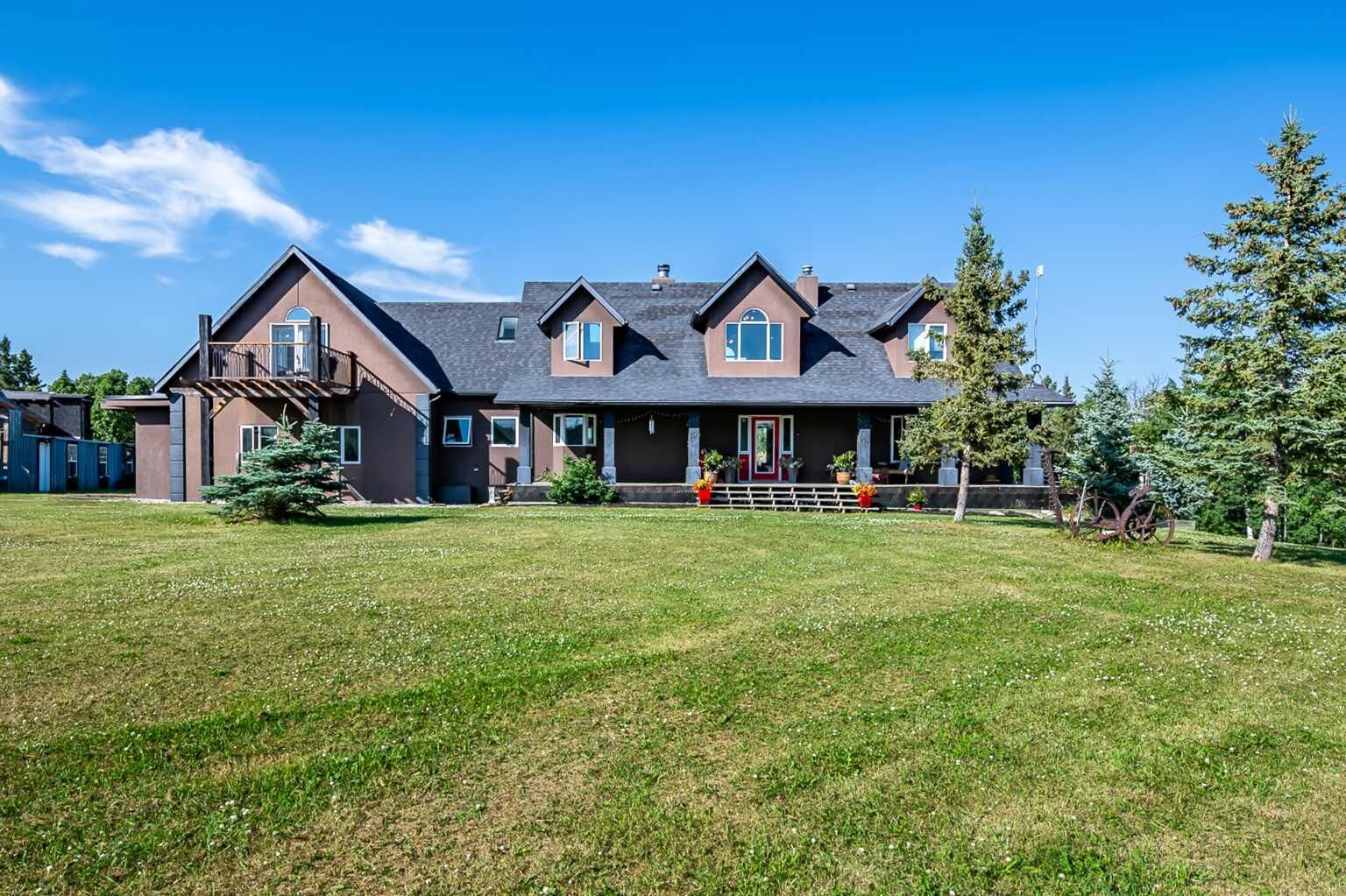 Property Photo: 311068 Parkins Road W AB T0L 1K0