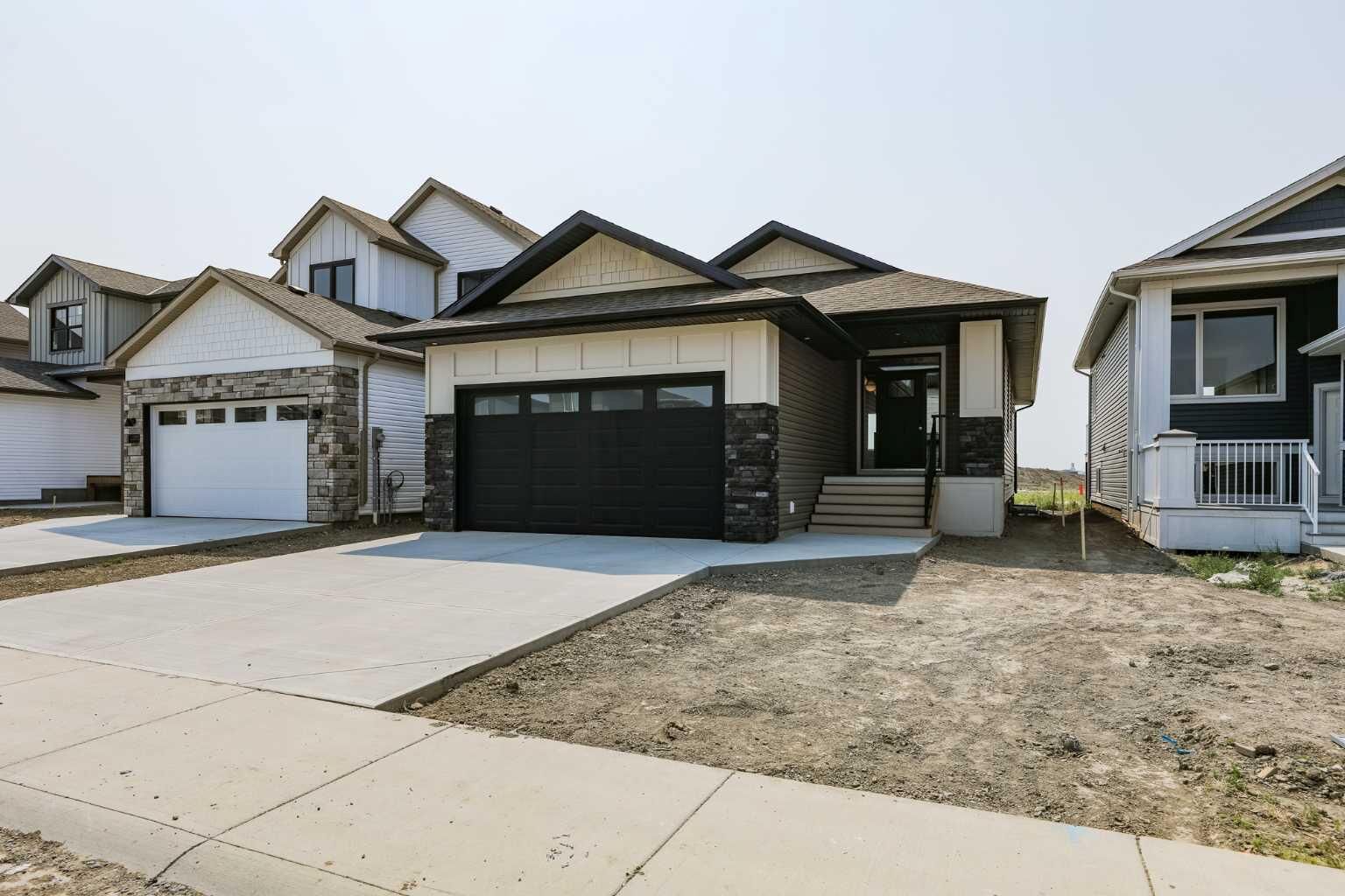 Property Photo:  562 Malahat Green W  AB T1J 5W4 