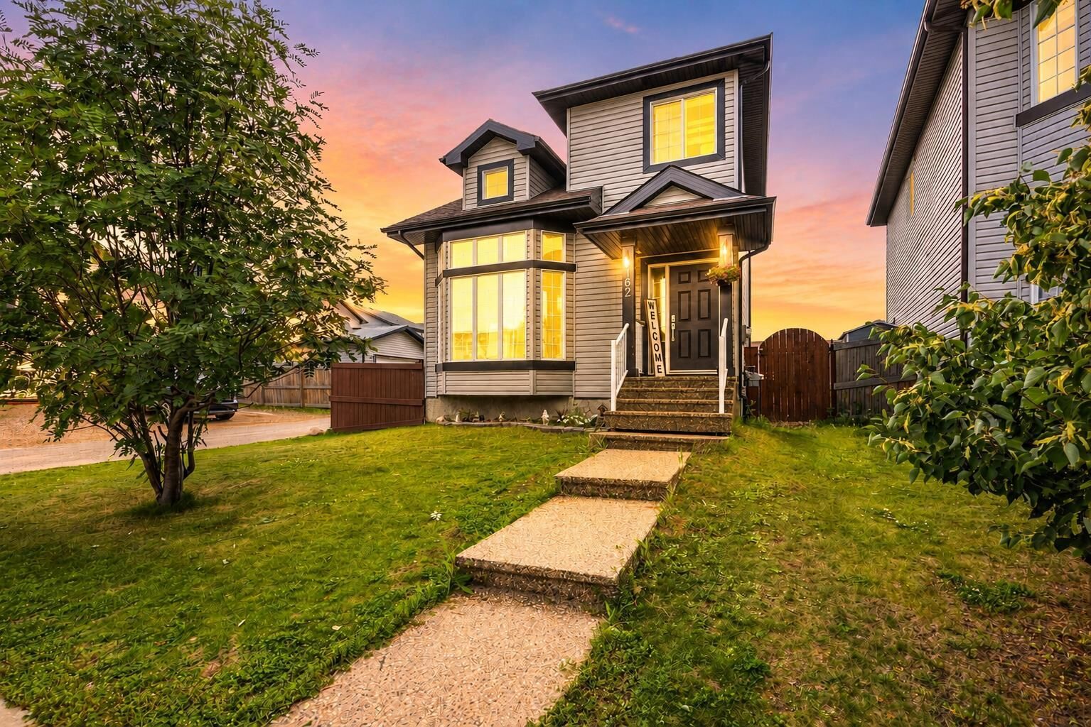 Property Photo: 162 Chestnut Way AB T9K 0M7