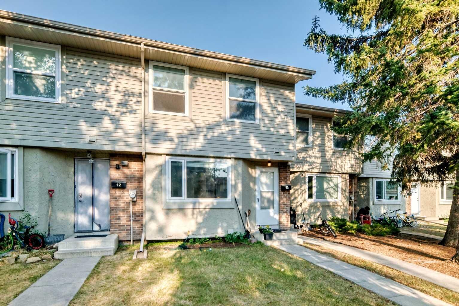 Property Photo: 123 Queensland Drive SE 13 AB T2J 3R3