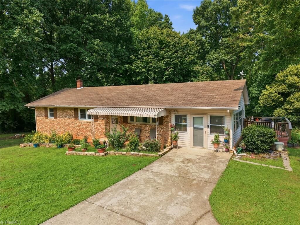 Property Photo:  5703 Summit Avenue  NC 27214 