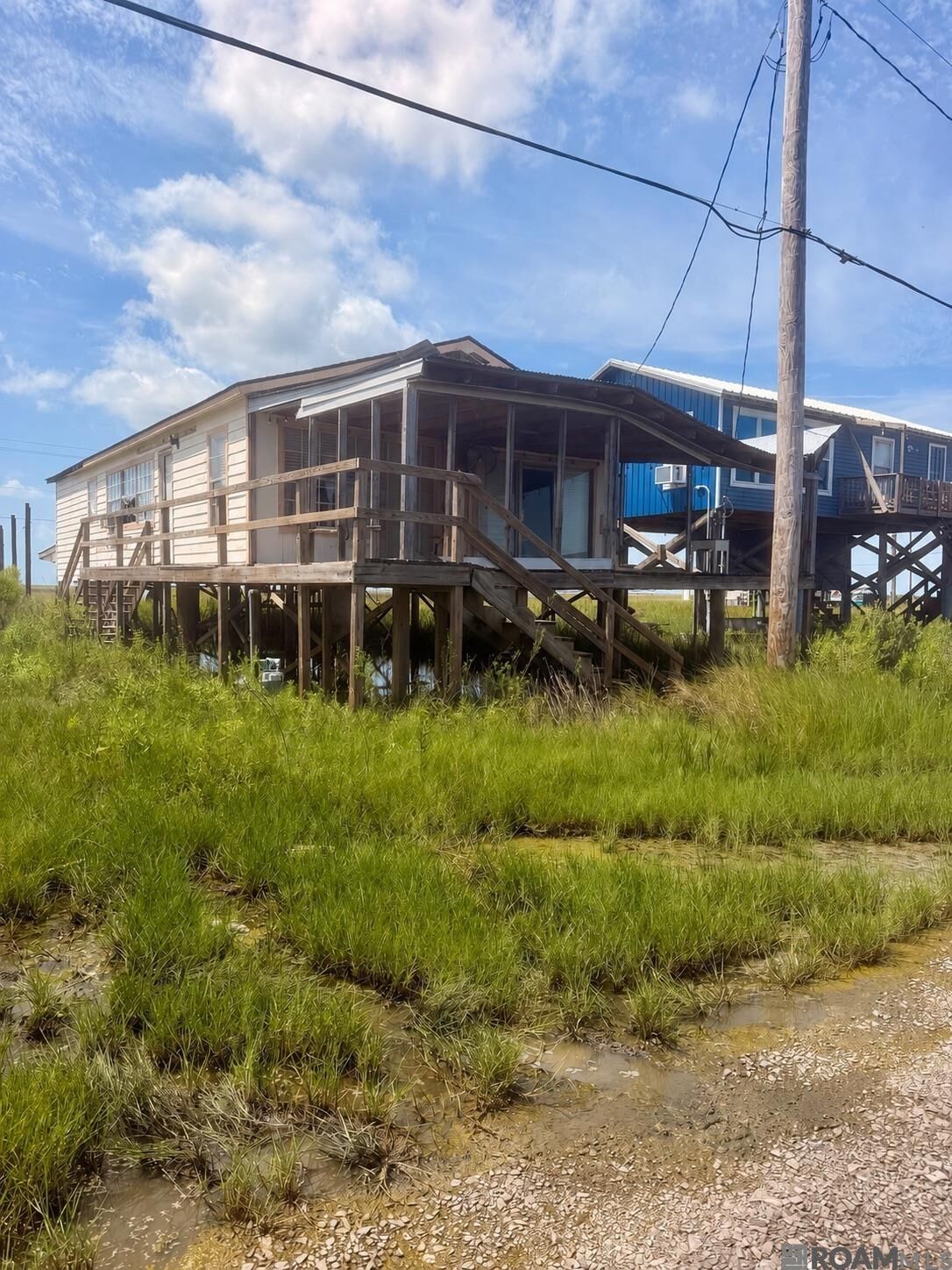 Property Photo:  8010 Redfish St  LA 70344 