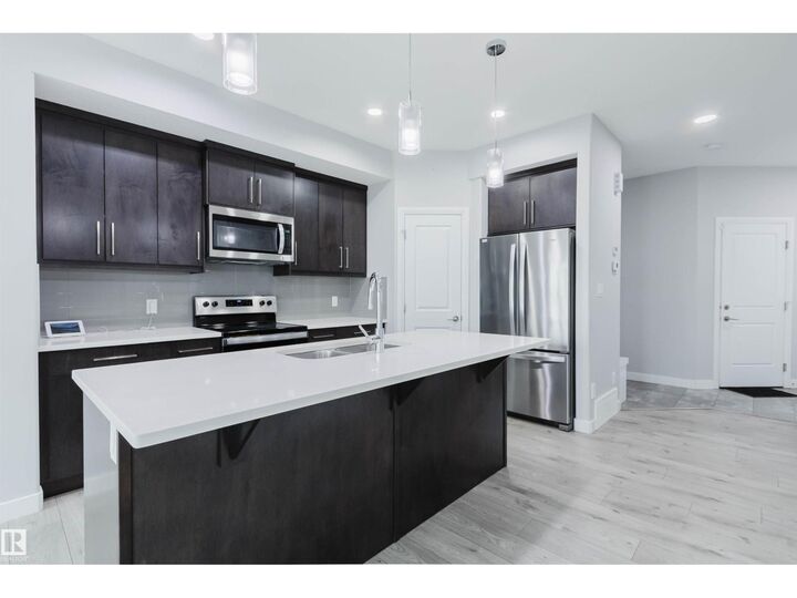 Property Photo:  6345 Cartmell Rd SW  AB T6W 4A3 