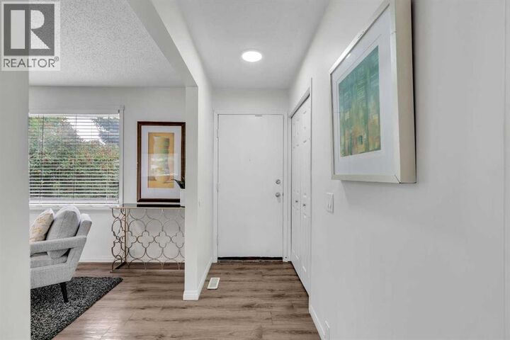 Property Photo:  27 Dovercrest Way Southeast  AB T3B 1X1 