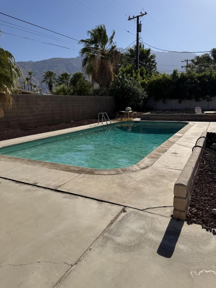 Property Photo:  897 E Racquet Club Road  CA 92262 