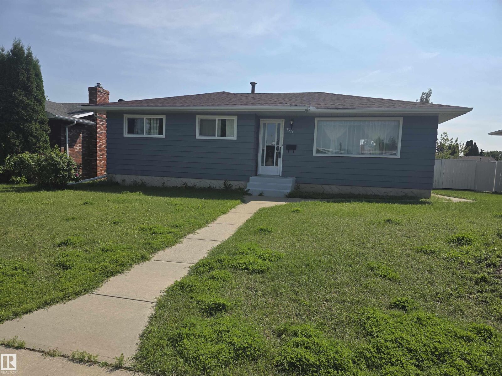 Property Photo:  7911 145 Avenue NW  AB T5C 2S8 