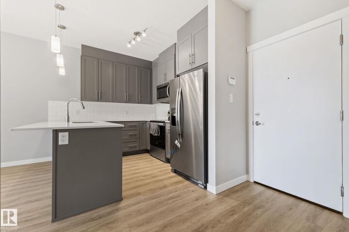 Property Photo:  812 Welsh Drive SW 121  AB T6X 1Y7 