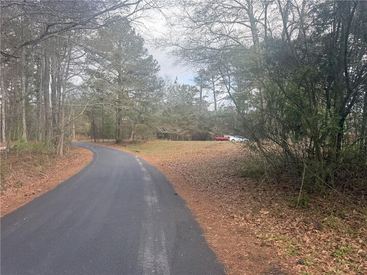 Property Photo:  8615 Smith James Road  GA 30039 