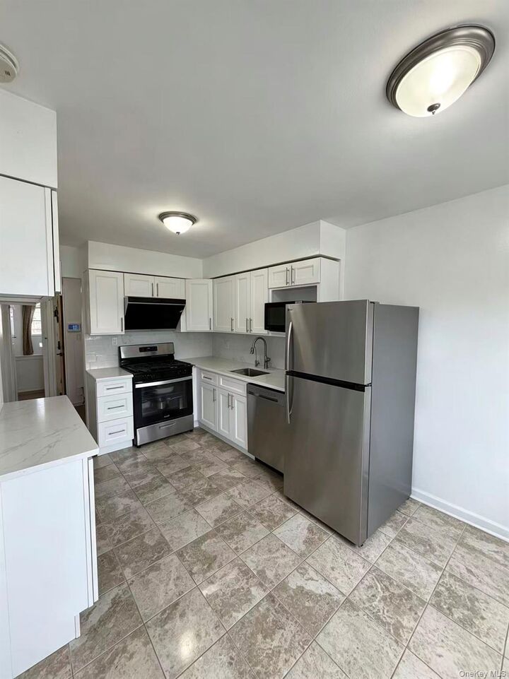 Property Photo:  4327 215th Street  NY 11361 