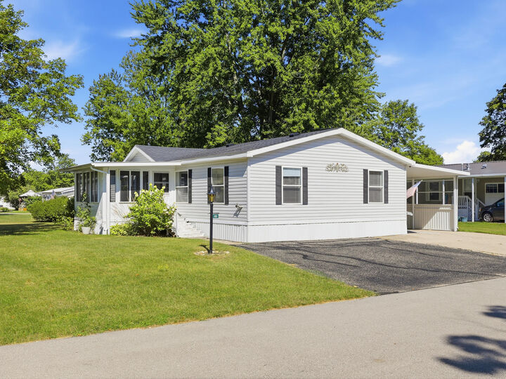 Property Photo:  65 Hemlock Avenue NE  MI 49319 
