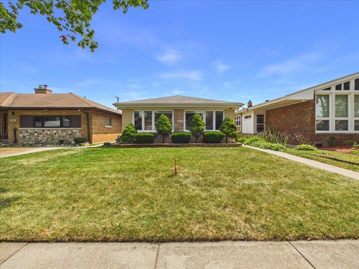 Property Photo:  7427 Keeler Avenue  IL 60076 