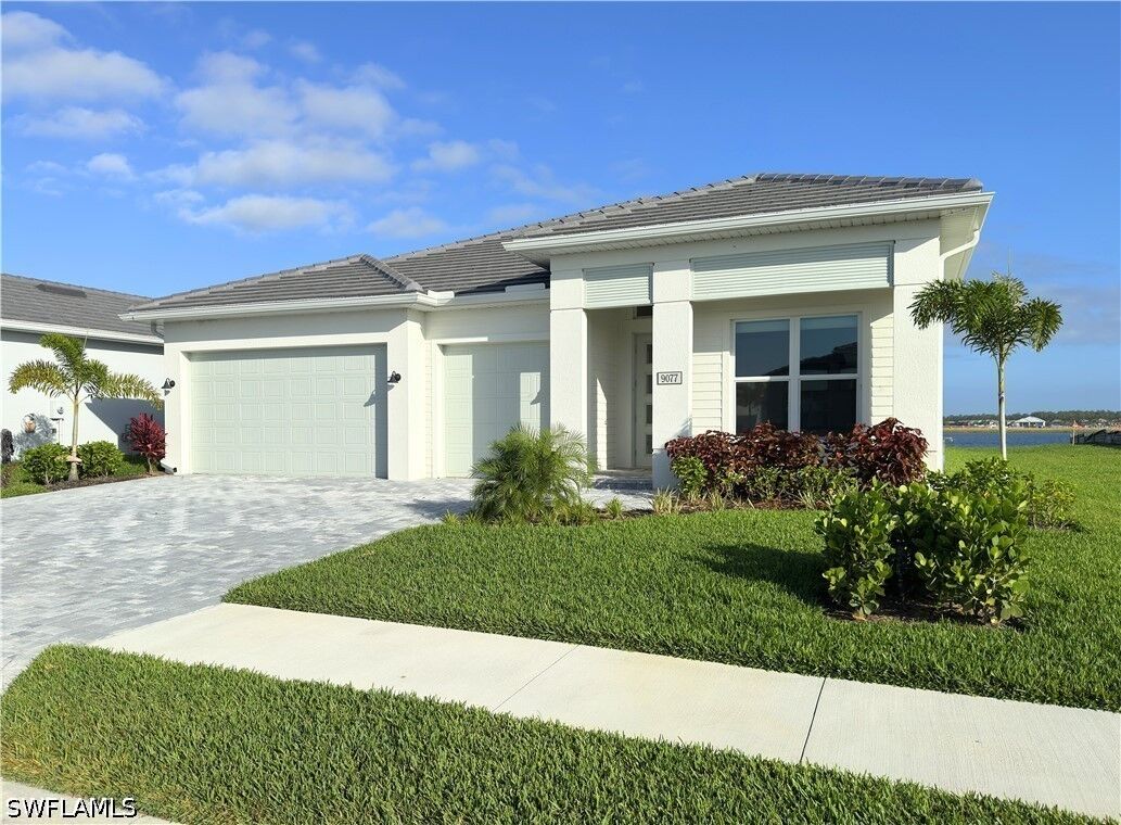 Property Photo: 9077 Wisteria Way FL 34114