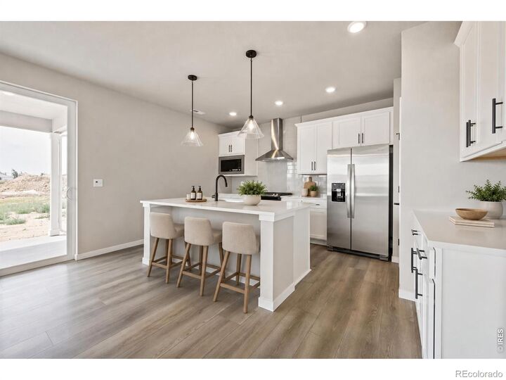 Property Photo:  7336 Swan River Street  CO 80530 