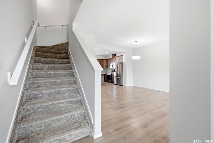 Property Photo:  5116 Primrose Green Drive E  SK S4V 3S5 