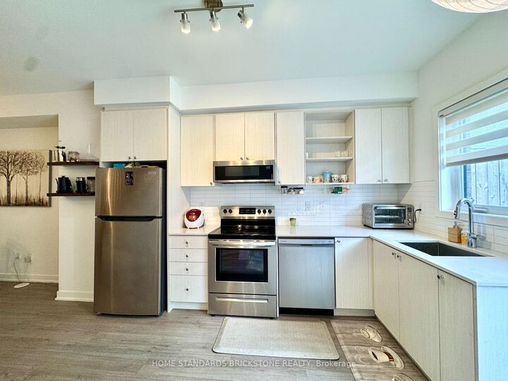 Property Photo:  100 Stanley Green Boulevard 4  ON M3K 0C8 