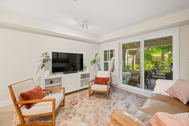 Property Photo:  19673 Meadow Gardens Way 104  BC V3Y 0A1 