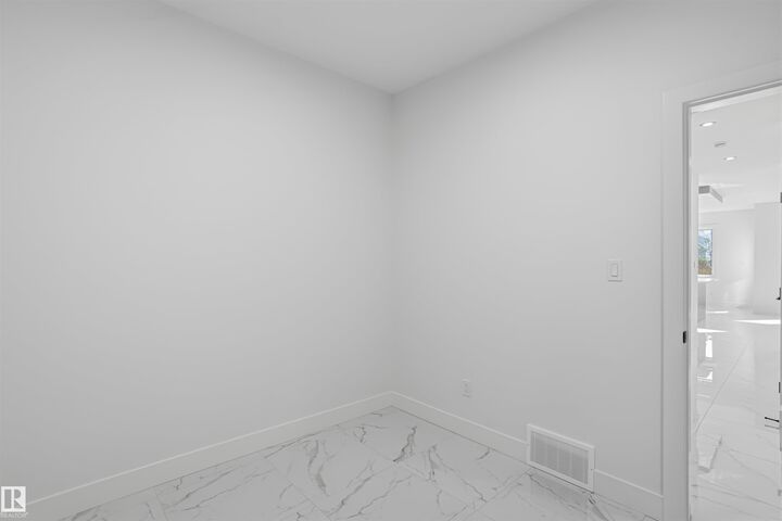 Property Photo: 1523 208 Street NW AB T6M 3N8