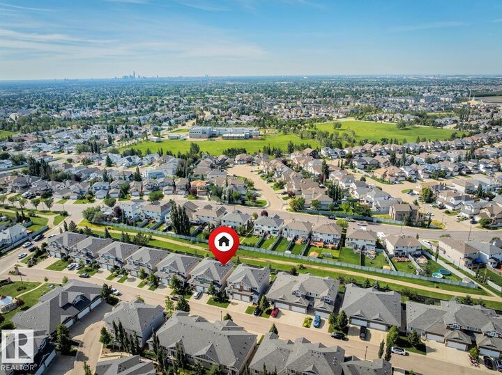 Property Photo:  18230 104A Street NW 12  AB T5X 0G9 