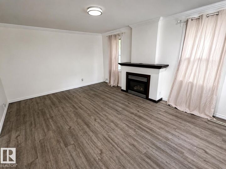 Property Photo:  12235 104 Street NW  AB T5G 2L7 
