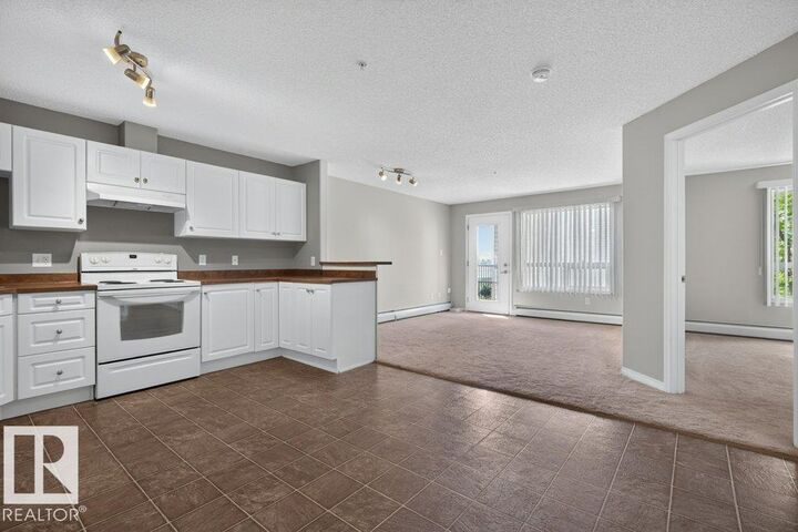 7331 South Terwillegar Drive NW 6215 — photo 1