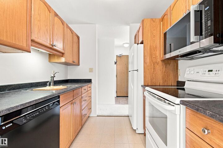 Property Photo:  10511 19 Av NW NW 115  AB T6J 5S8 