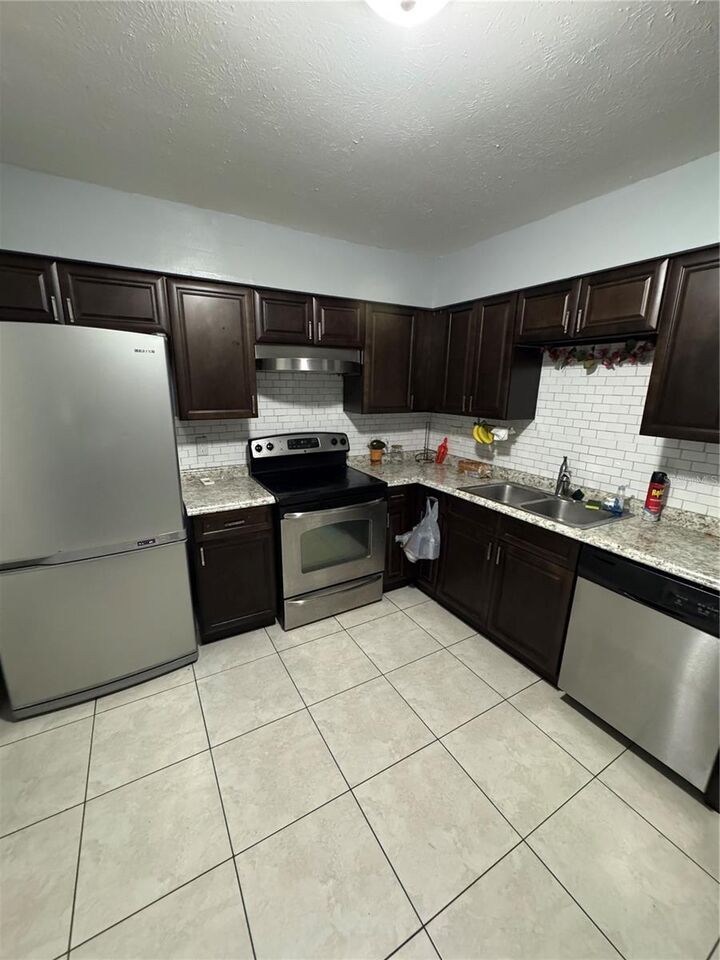 Property Photo:  1800 Warringwood Drive C6  FL 32839 