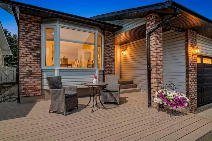Property Photo: 140 Woodglen Way SW AB T2W 4T3